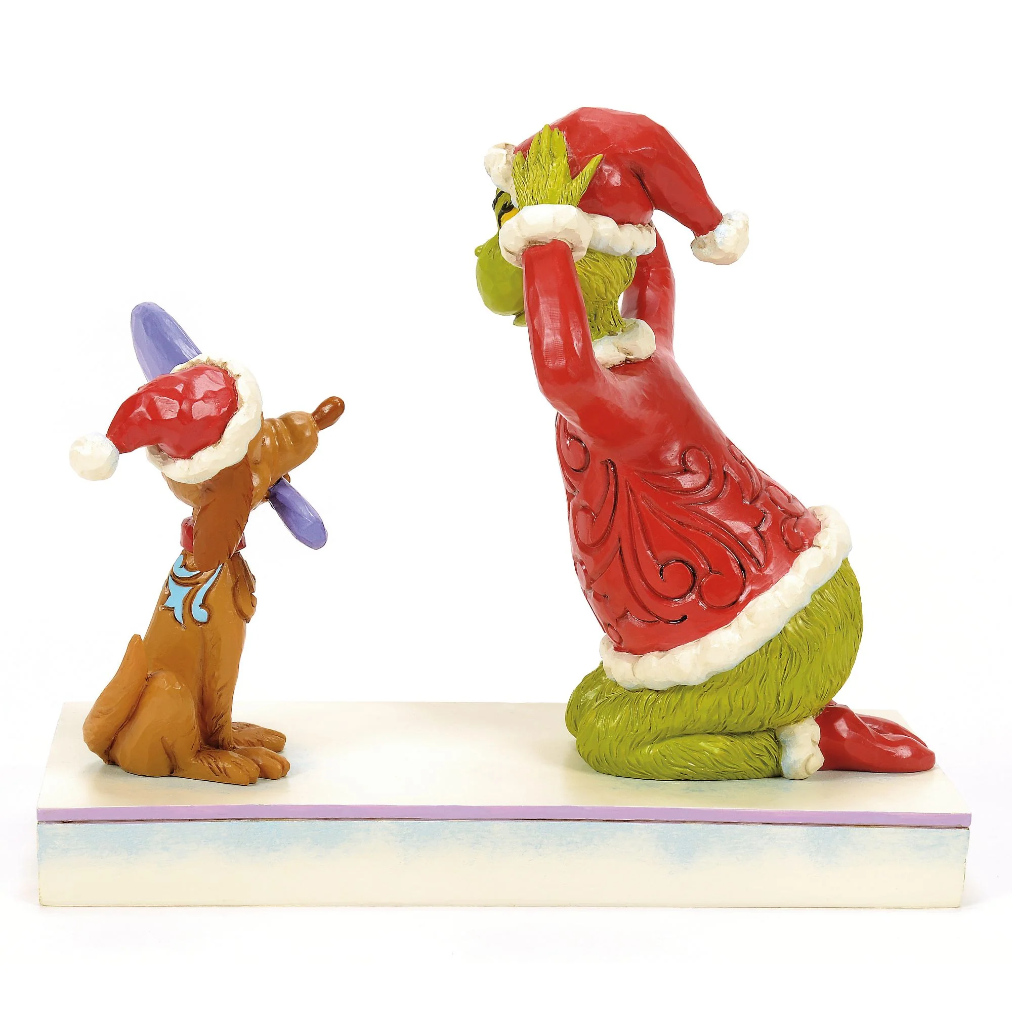 Max Holding a Mirror for the Grinch Figurine - Image 3